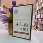 Libro Adiós a mí de pie junto a flores moradas en la librería – imagen 6